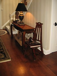 Wood plank flooring installed in foyer